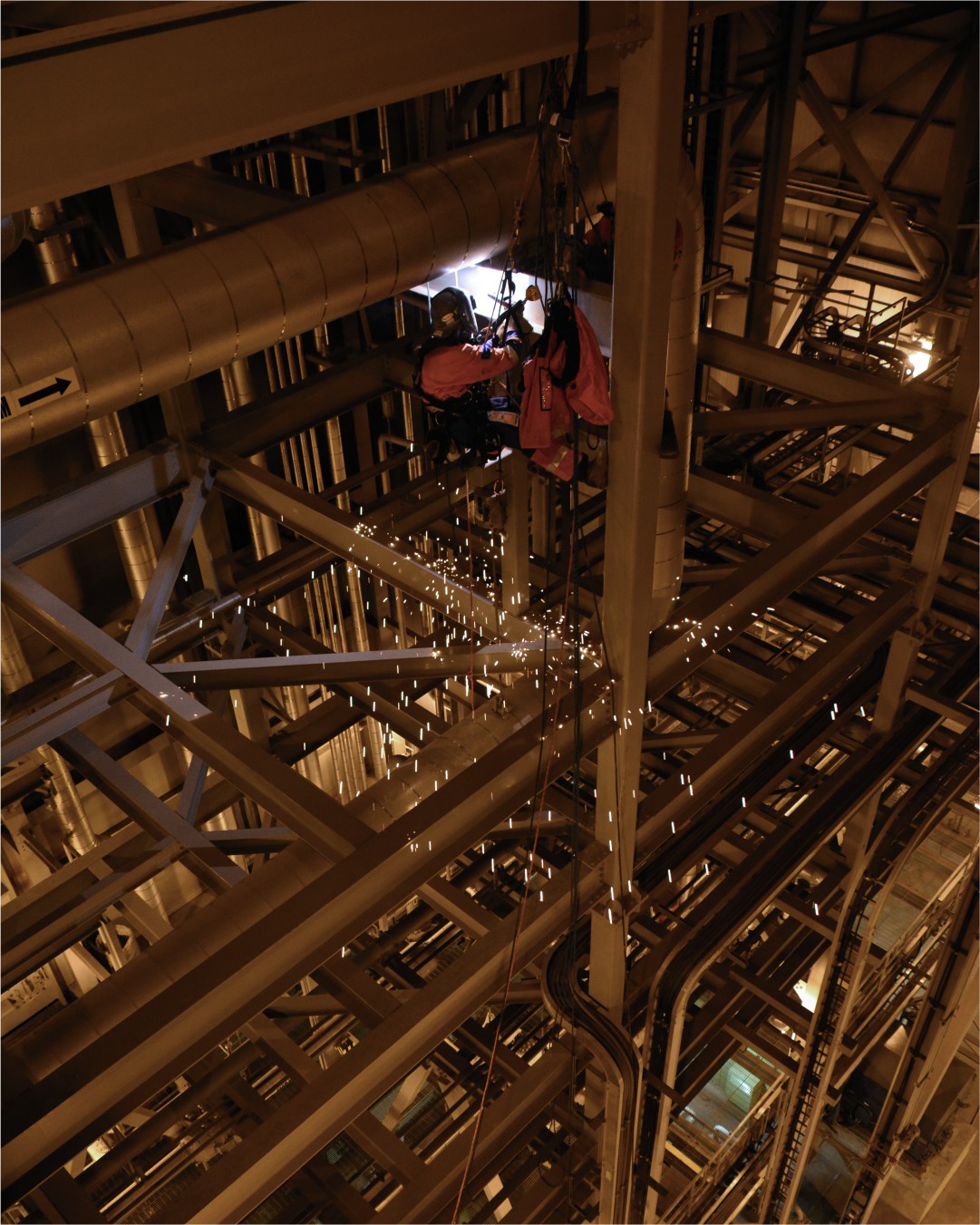 Industrial-Rope-Access-Maintenance Alternative Text: RAM Access Maintenance team performing high-altitude industrial rope access work.