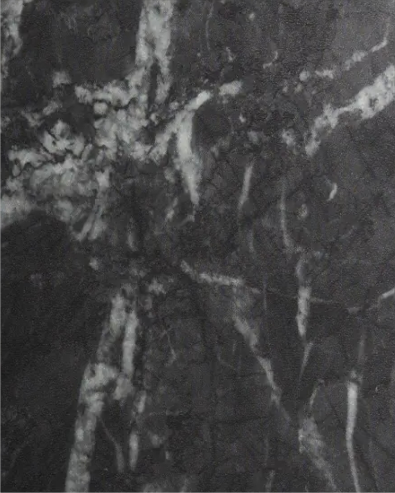 Dark stone architectural surface film with mineral texture used for interior wall applications