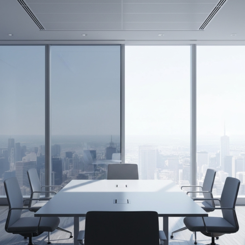 Solar Control & Anti-Glare Window Tinting – Concept Graphics Commercial window tinting installation in an office, showing a side-by-side comparison of solar control film reducing glare and heat from the sun.